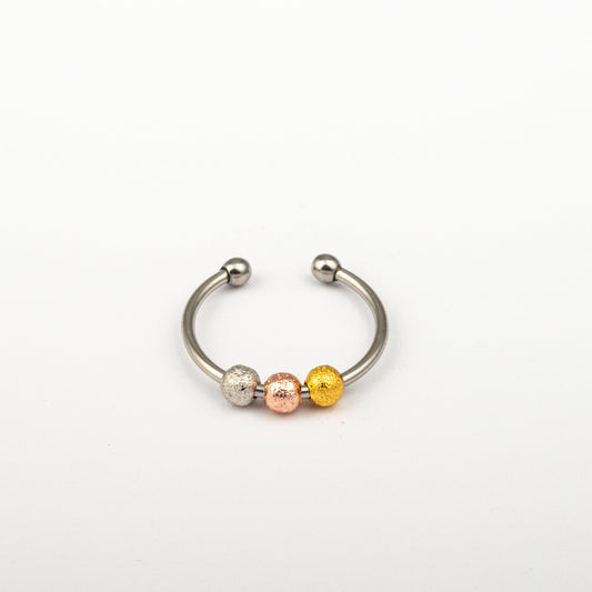Anillo Anti-Estrés Deslizante Bolitas Julio Tricolor